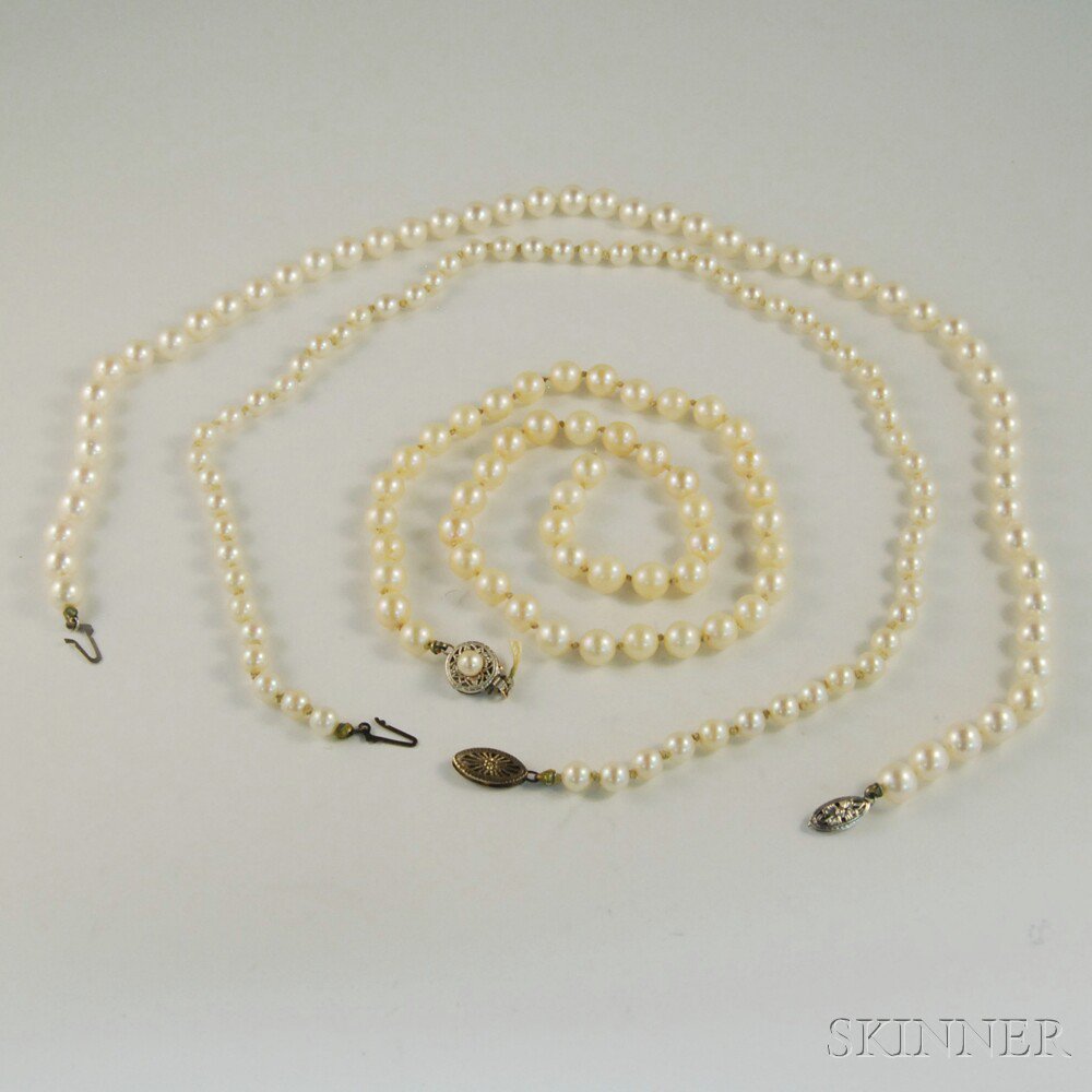 Appraisal: Three Strands of Cultured Pearls two with kt gold filigree