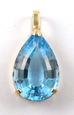 Appraisal: BLUE TOPAZ AND YELLOW GOLD PENDANT The k gold pendant