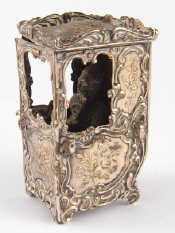 Appraisal: A miniature sedan chair with lady passenger apparently unmarked Ht