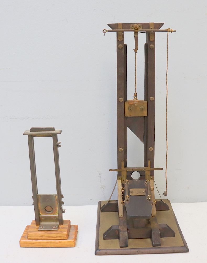 Appraisal: Vintage Guillotine Cigar Cutters Designed to resemble the well-known beheading