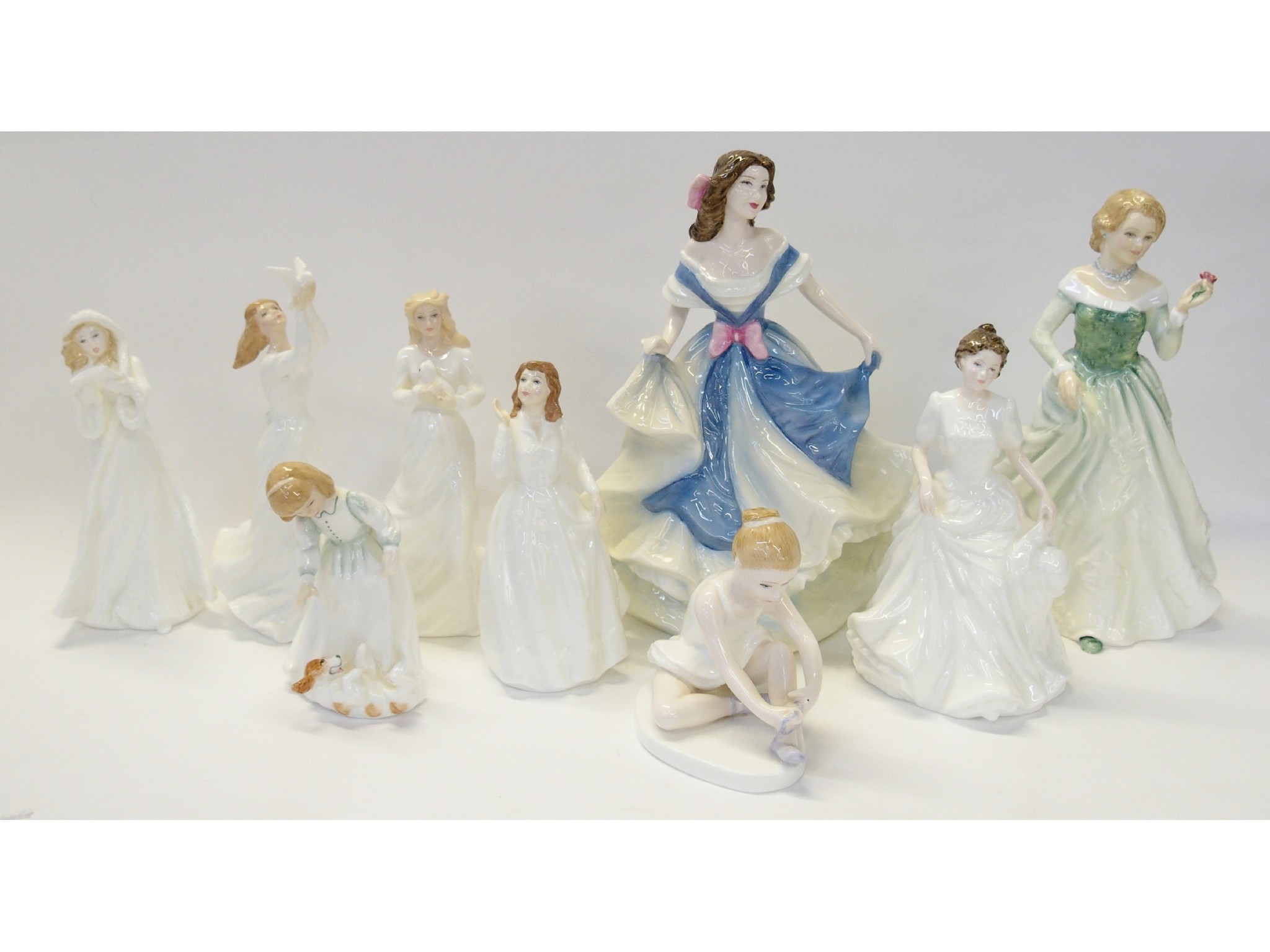 Appraisal: Nine Royal Doulton figures comprising Ballet Shoes Christmas Carols Let's