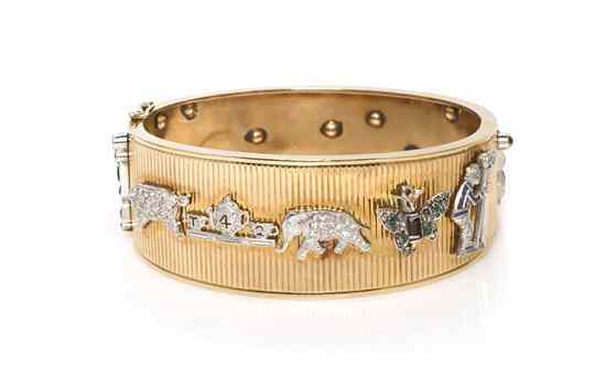 Appraisal: A Vintage Yellow Gold Bangle Bracelet with Attached Art Deco