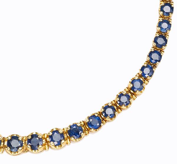 Appraisal: A sapphire rivi re necklace set with sixty-seven faceted sapphires