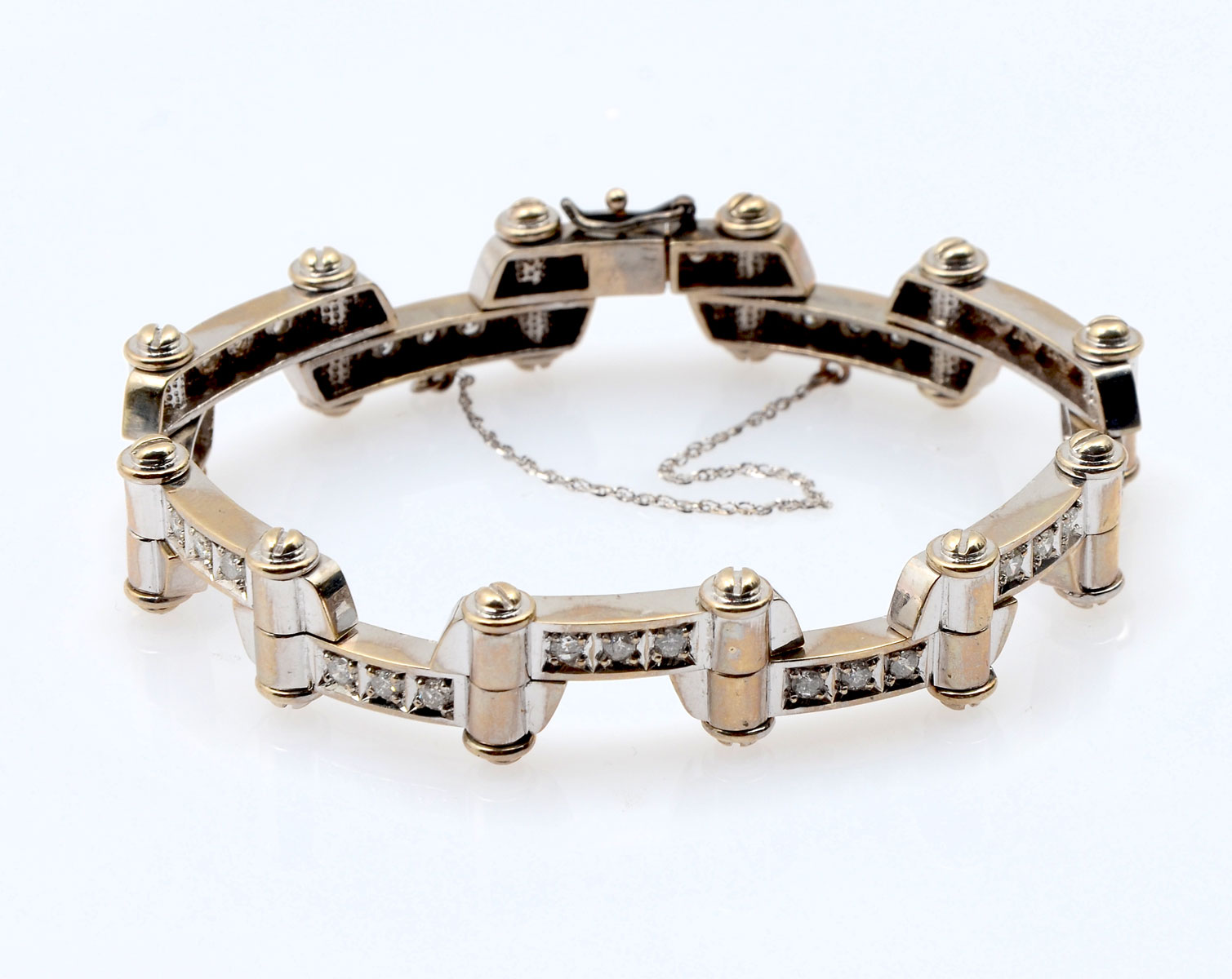 Appraisal: UNIQUE K DIAMOND BRACELET WITH ARTICULATING LINKS round brilliant cut