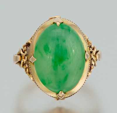 Appraisal: A Chinese Gold and Jadeite Cabochon Ring k yellow gold