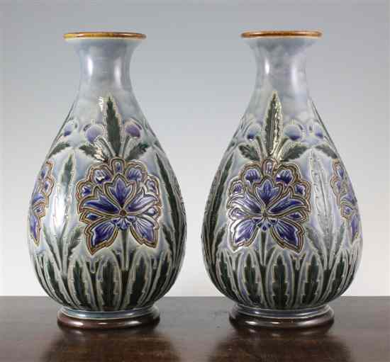 Appraisal: A pair of Doulton Lambeth stoneware pear shaped vases by