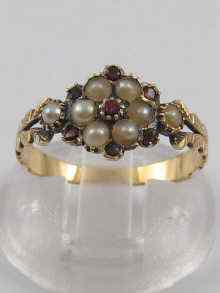 Appraisal: An antique yellow metal tests gold garnet and pearl ring