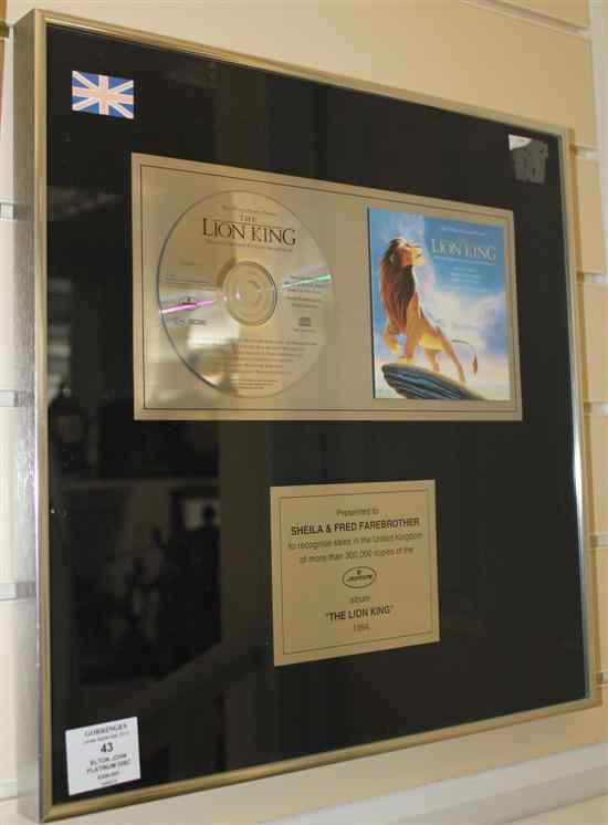 Appraisal: Elton John A UK platinum disc for ''The Lion King''