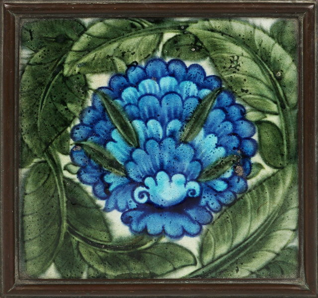 Appraisal: William de Morgan British - Persian flowering foliage tilein turquoise