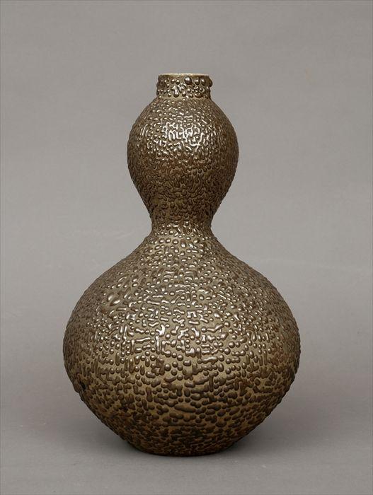 Appraisal: Japanese Pottery Relief-Decorated Double Gourd-Form Vase in Provenance Property from