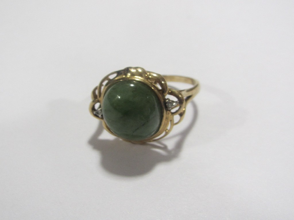 Appraisal: Nine carat gold jade and diamond set dress ring