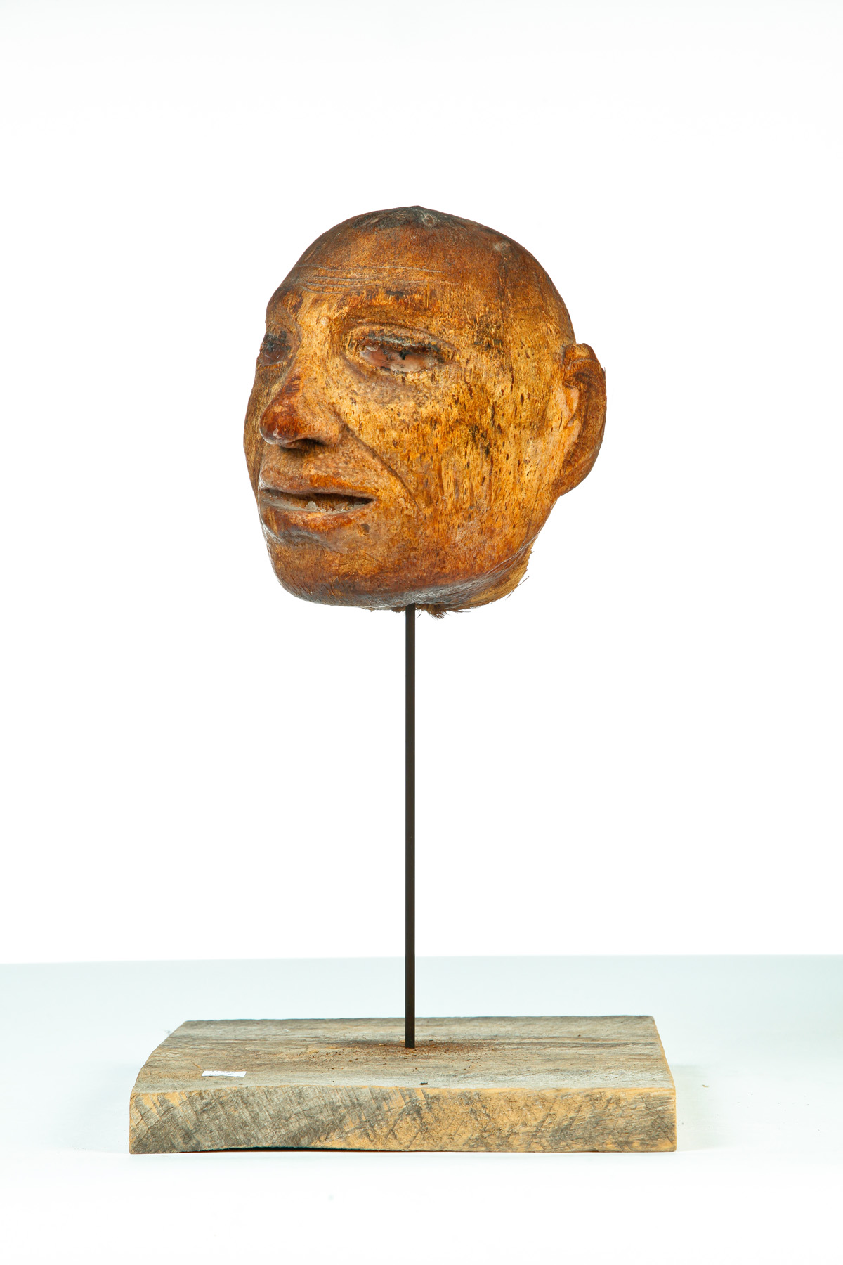 Appraisal: HAND CARVED COCONUT HEAD Twentieth century Folksy carved coconut head