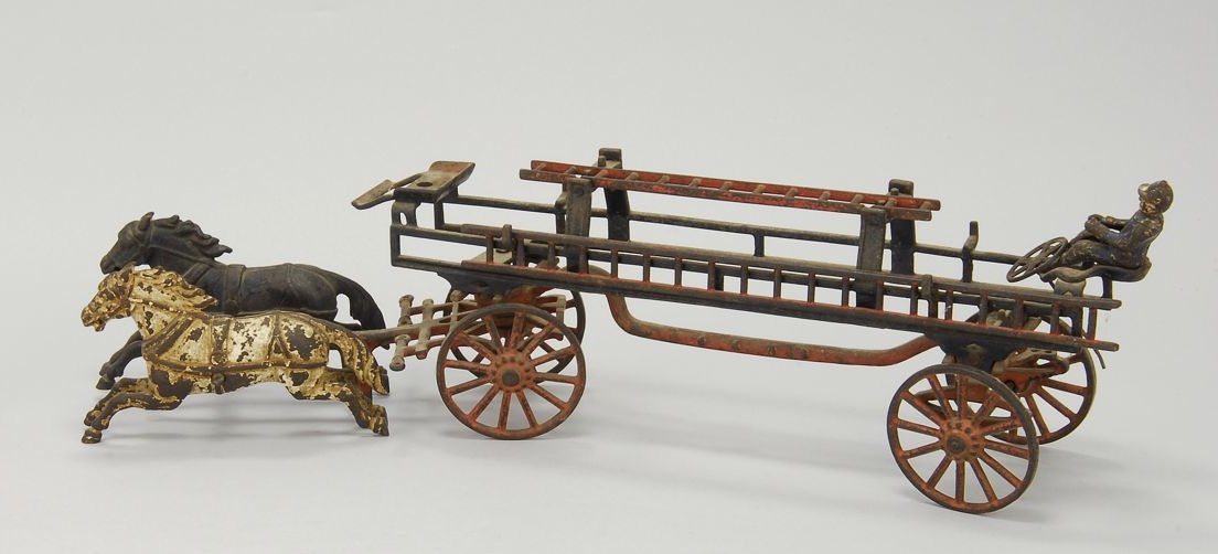 Appraisal: CAST IRON HORSE-DRAWN LADDER WAGON th CenturyOriginal paint with considerable