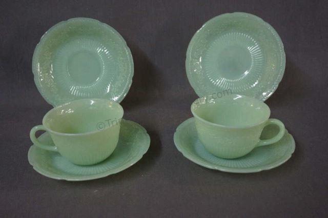 Appraisal: Fire King Jadeite Alice Cups and Saucers 's Produced by