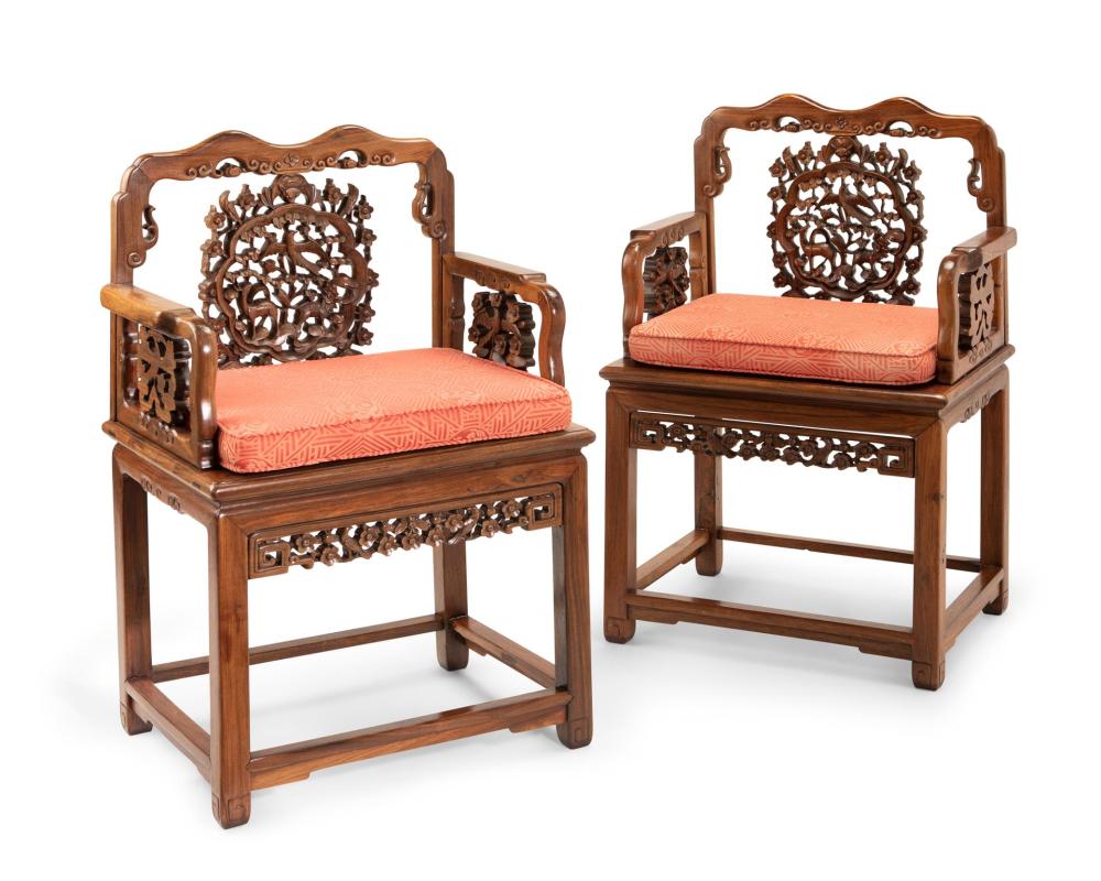 Appraisal: A pair of Chinese carved hardwood armchairs Mid- th Century