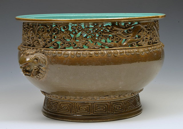 Appraisal: A CHINESE TEA DUST AND TURQUOISE JARDINIERE with foliate and