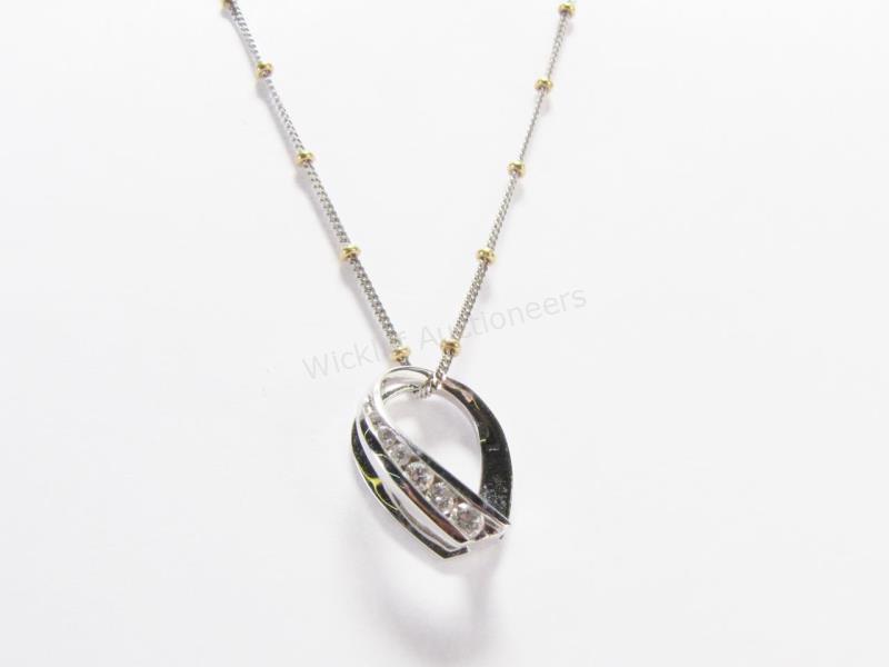 Appraisal: K white gold and diamond pendant necklace including a pendant