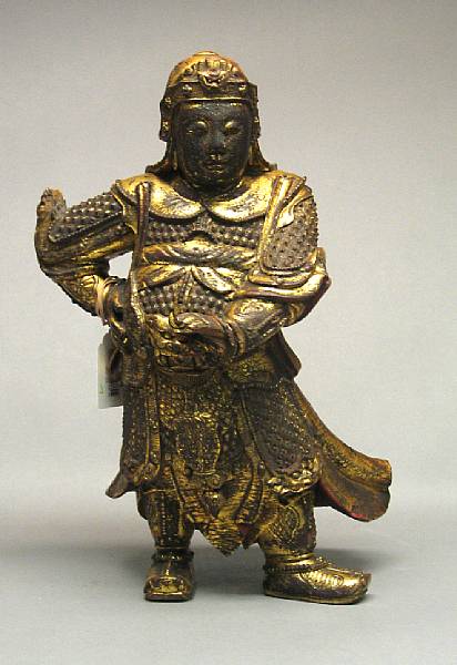 Appraisal: A Ming style polychrome and gilt lacquered wood figure of