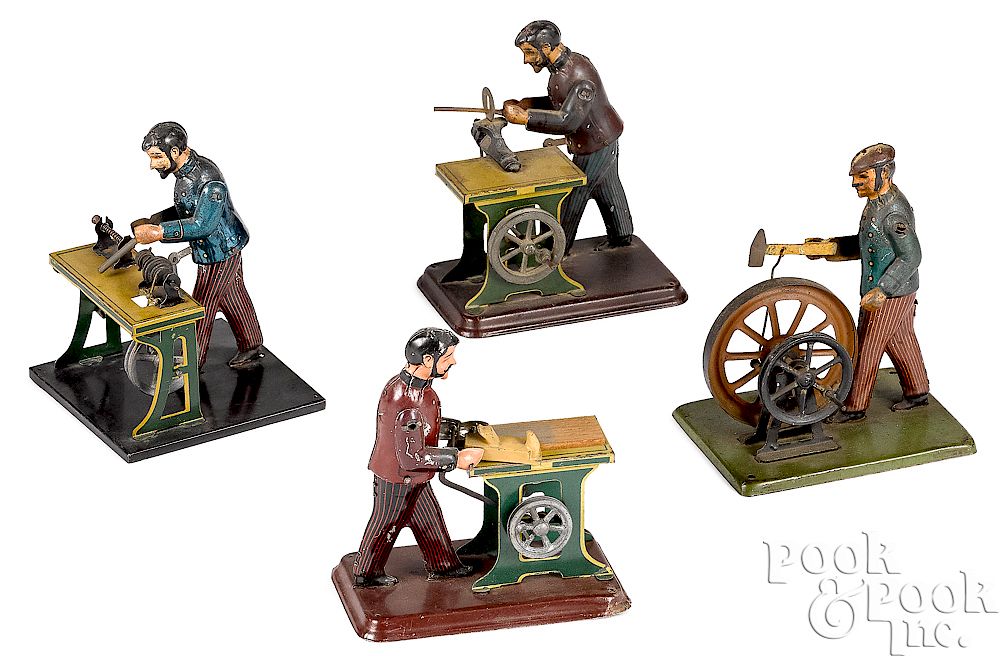 Appraisal: Four Carette factory worker steam toy accessories Four Carette lithograph