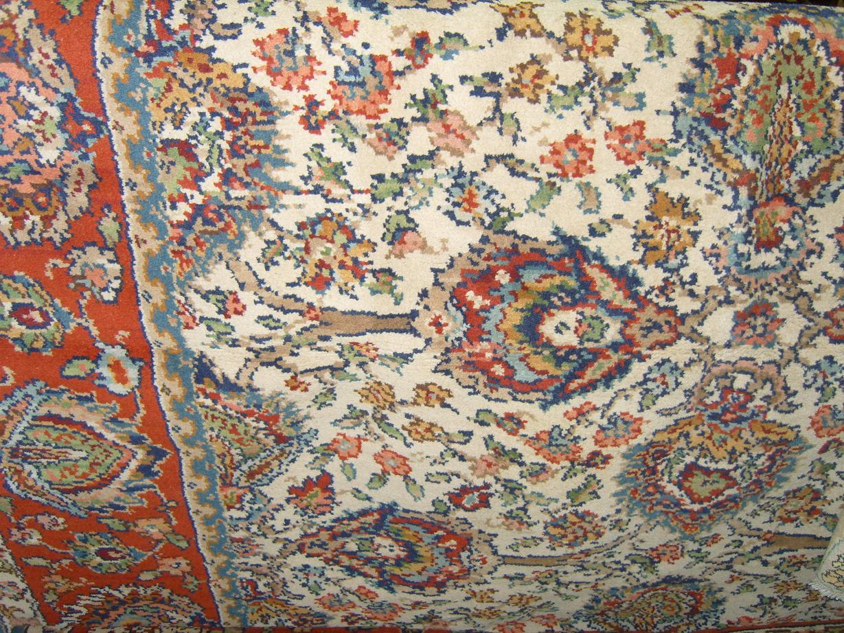 Appraisal: A large cream ground carpet with Persian style flowering tree