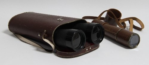 Appraisal: A three-draw brass telescope with leather case and a pair