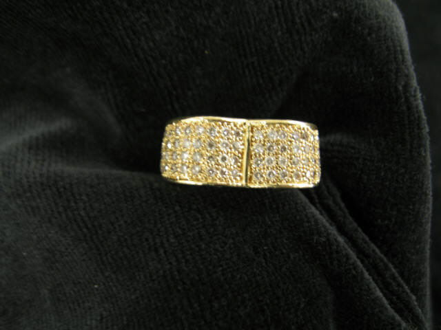 Appraisal: Diamond Fashion Ring carats in fancy scroll k yellow gold