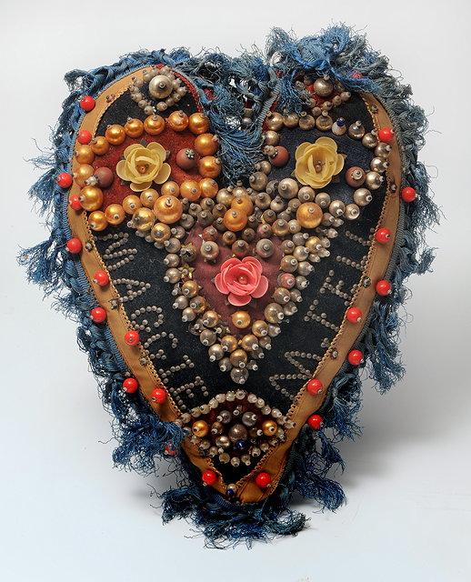 Appraisal: A VICTORIAN SAILOR'S VALENTINE heart shaped with polychrome beaded and