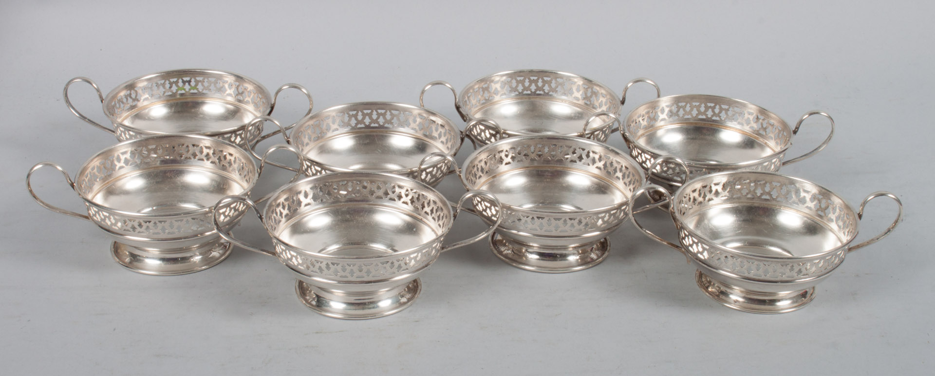 Appraisal: Eight Meriden sterling bouillon cup frames no liners ozt