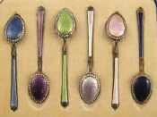 Appraisal: A set of six Scandinavian enamelled silver coffee spoons in