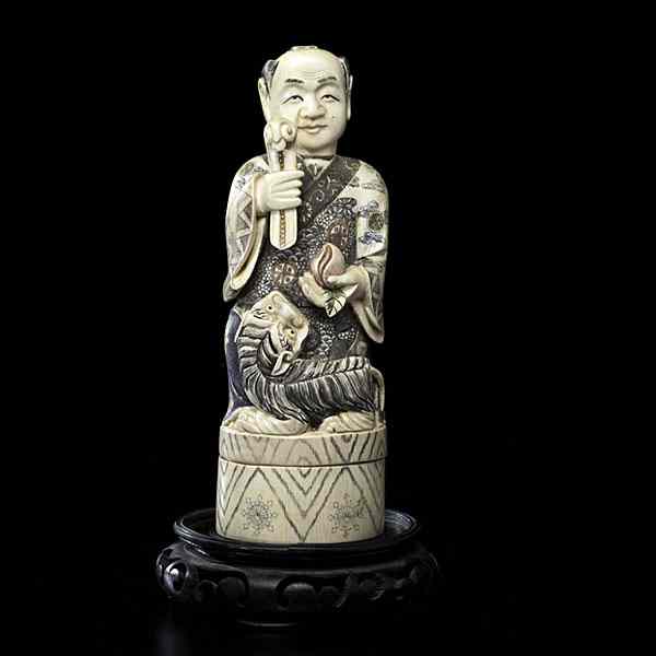 Appraisal: Japanese Ivory Figural Box Japanese th century A carved and