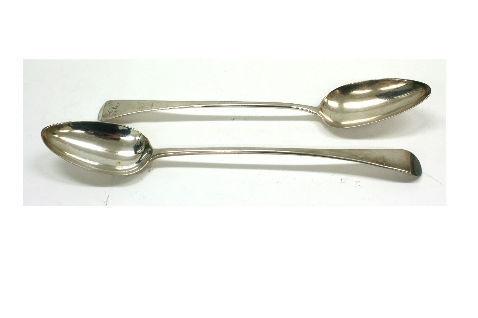 Appraisal: Two George IIl Old English pattern silver basting spoons one