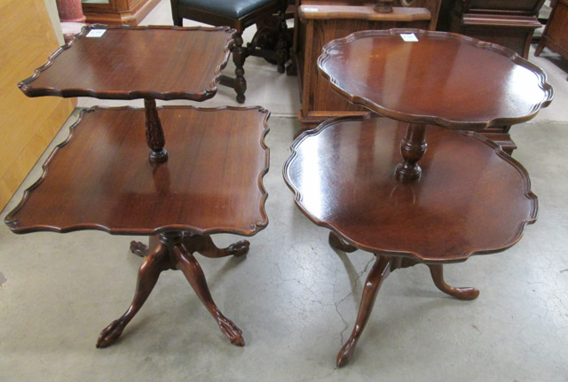 Appraisal: TWO MAHOGANY TWO-TIER LAMP TABLES American mid- th century one