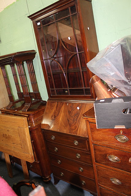 Appraisal: A GEORGIAN STYLE MAHOGANY NARROW BUREAU BOOKCASE the glazed door