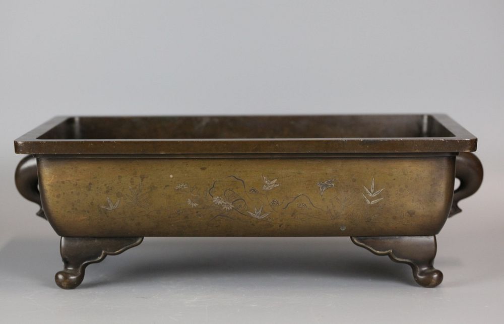 Appraisal: Japanese bronze rectangular vessel possibly th c inlaid with silver