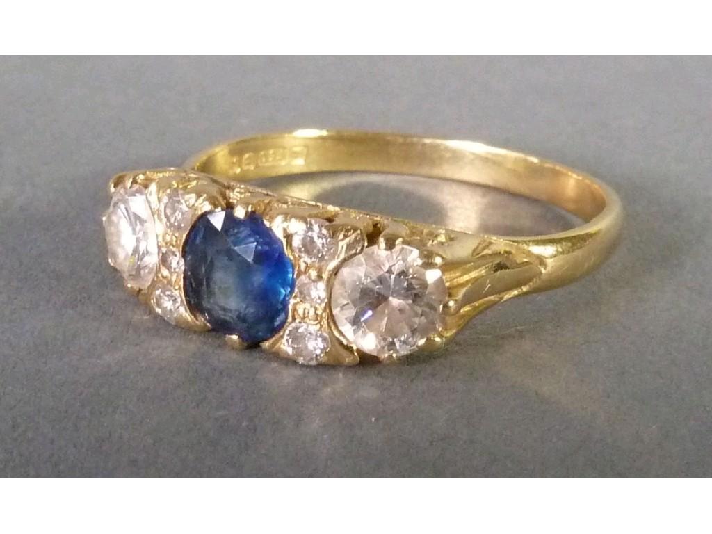 Appraisal: ct GOLD SAPPHIRE AND DIAMOND RING set with centre circular