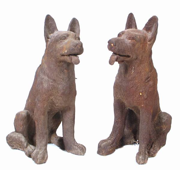 Appraisal: Two small cast iron figures of dogs in the form