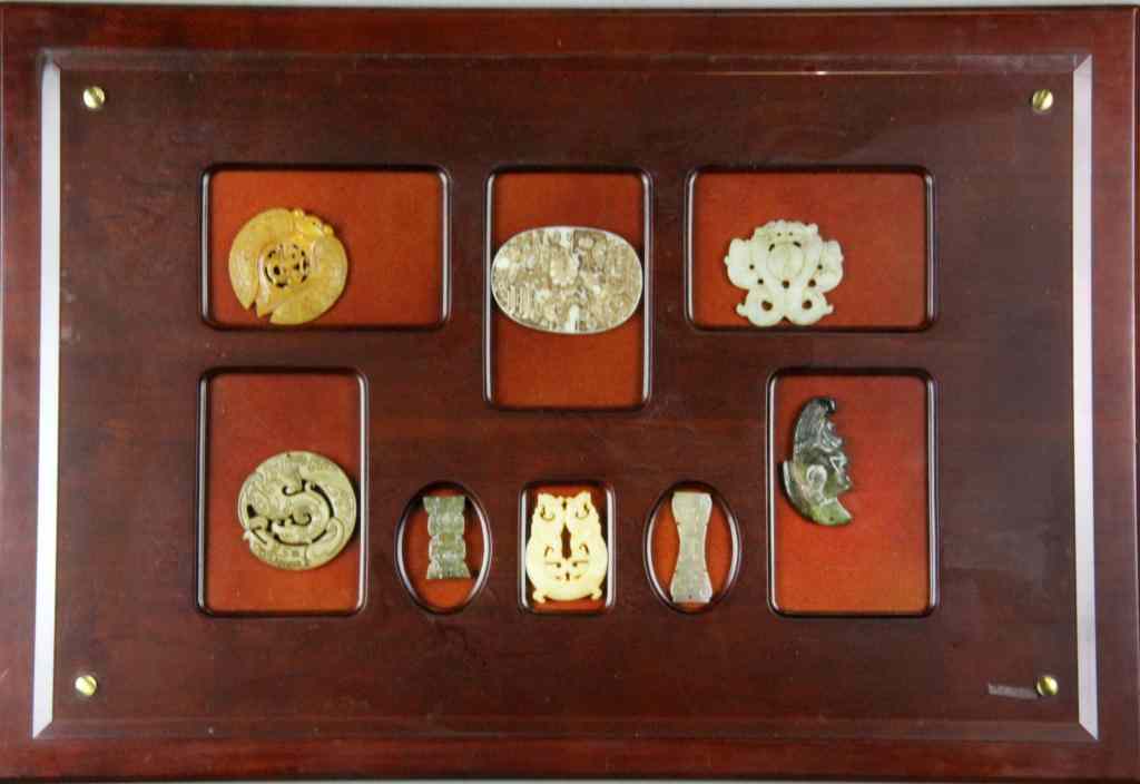 Appraisal: Chinese Framed Archaic Style Jade PlaquesConsisting of eight jade plaques