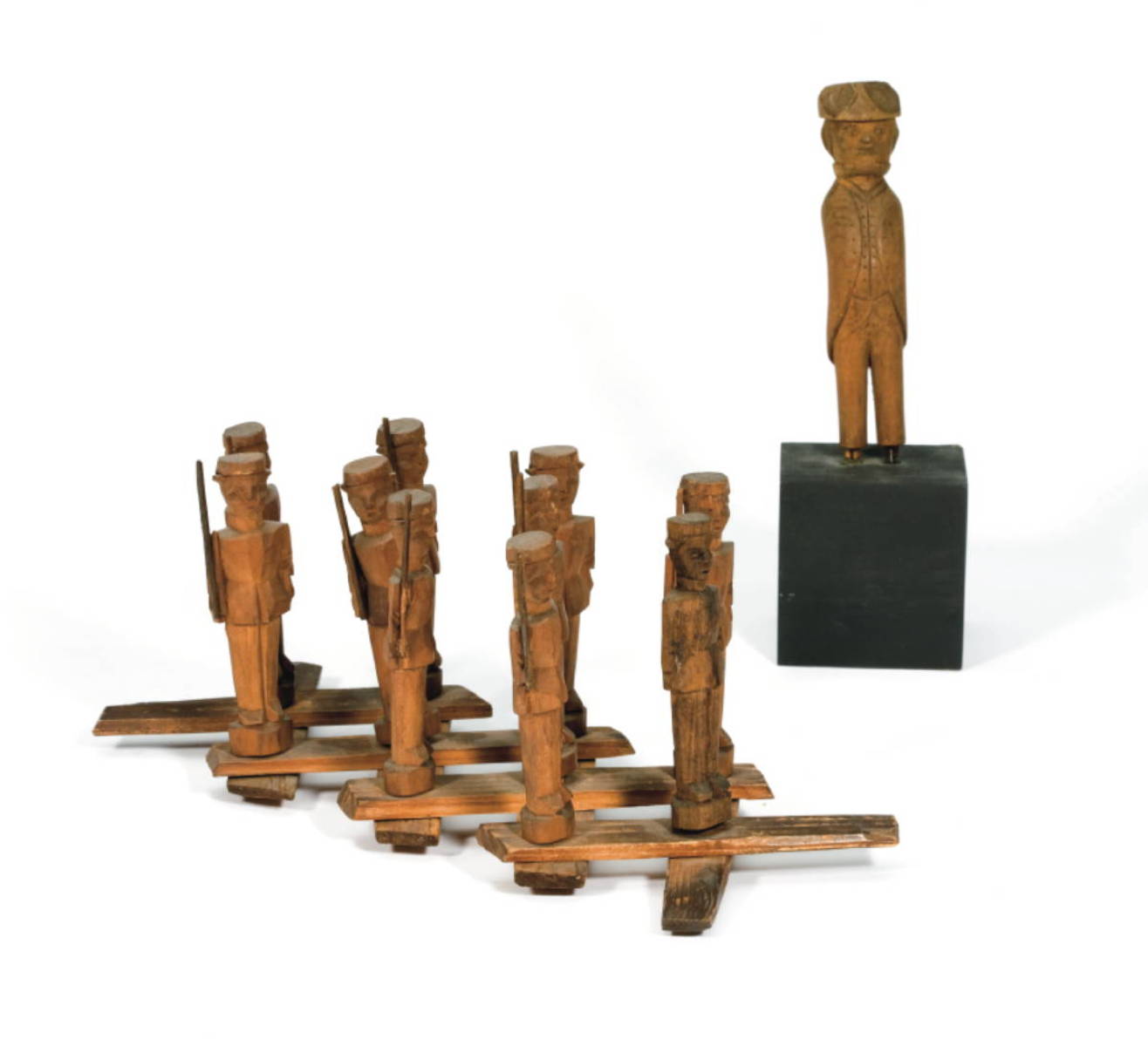 Appraisal: AMERICAN FOLK CARVED FIGURE OF AN ARMLESS SOLDIER AND A