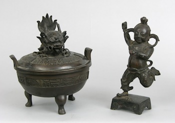 Appraisal: A Chinese Incense Burner and a Figurine of a Running