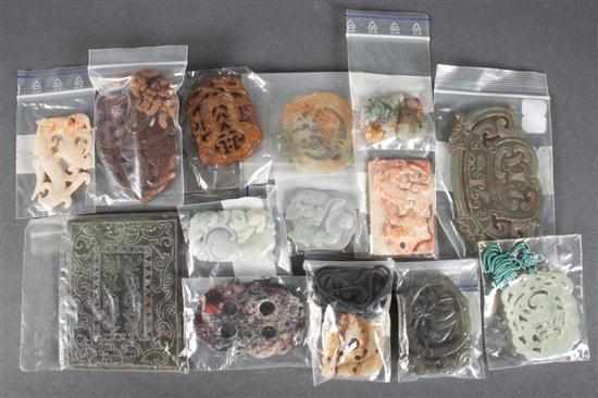 Appraisal: Assortment of Chinese carved jade and hardstone amulets Estimate -