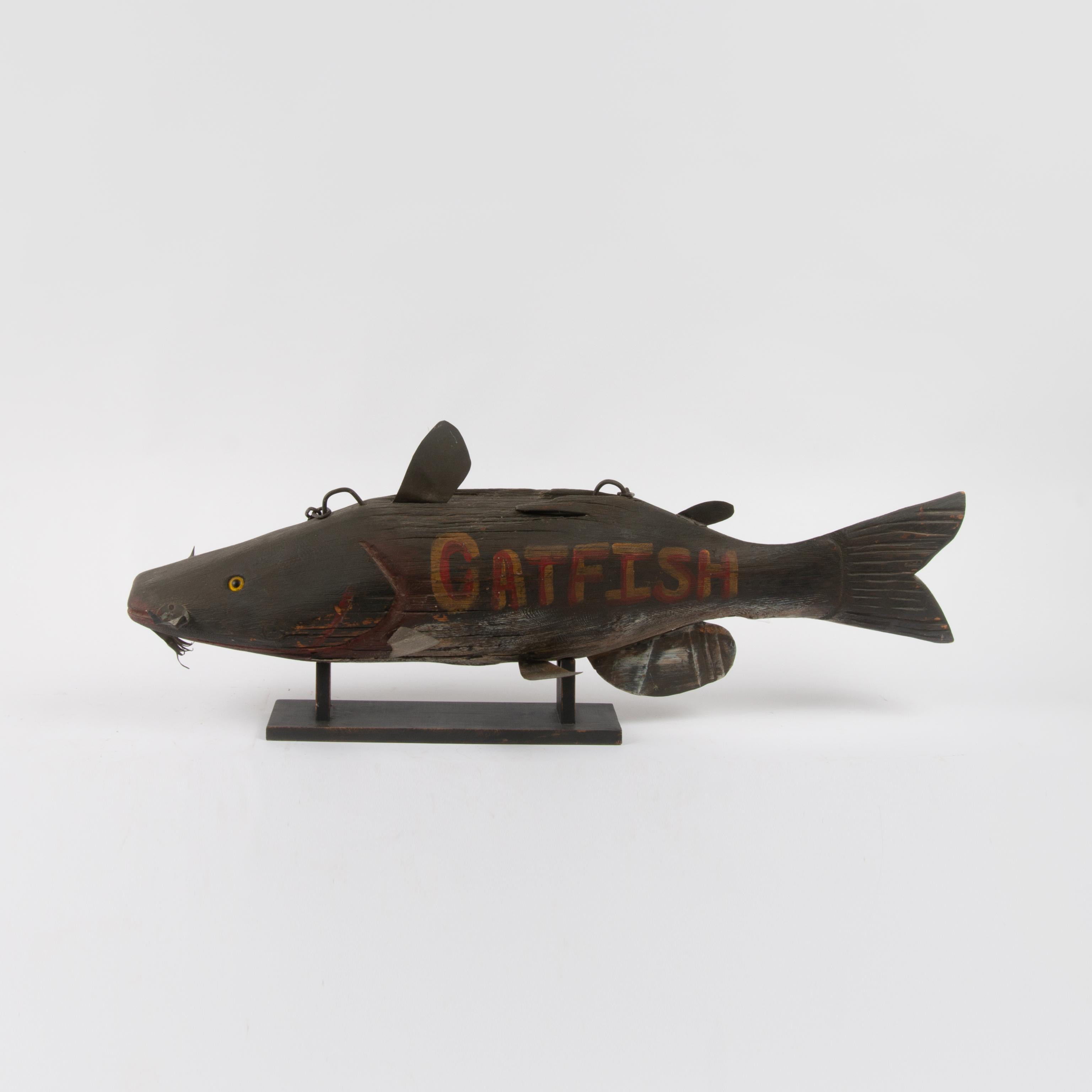 Appraisal: FOLK ART CATFISH TRADE SIGN A carved wood folk art