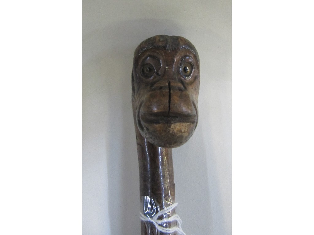 Appraisal: Walking stick with handle modelled as a monkey's head