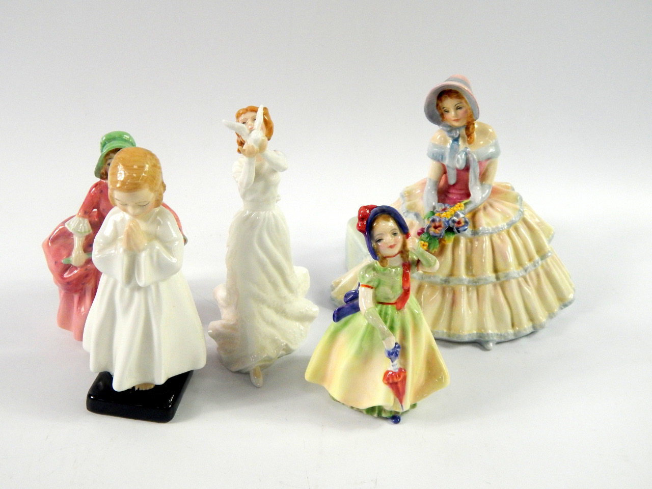 Appraisal: A group of Royal Doulton figures comprising Daydreams HN Bedtime