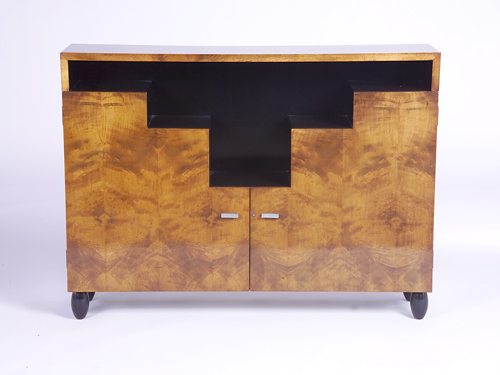 Appraisal: MODERNAGE Stepped cabinet with burled veneer exterior and two doors