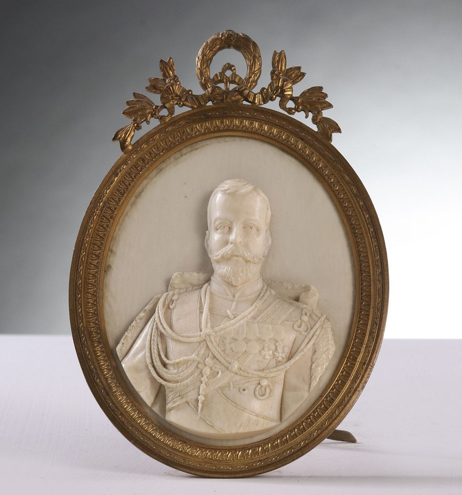 Appraisal: A CARVED IVORY RELIEF BUST PORTRAIT OF TSAR NICHOLAS II