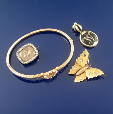 Appraisal: A diamond set gold butterfly brooch the wings set with