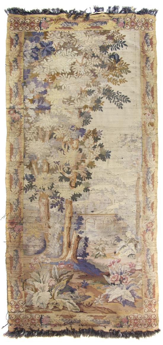 Appraisal: French Tapestry decorated with a bridge in a landscape within