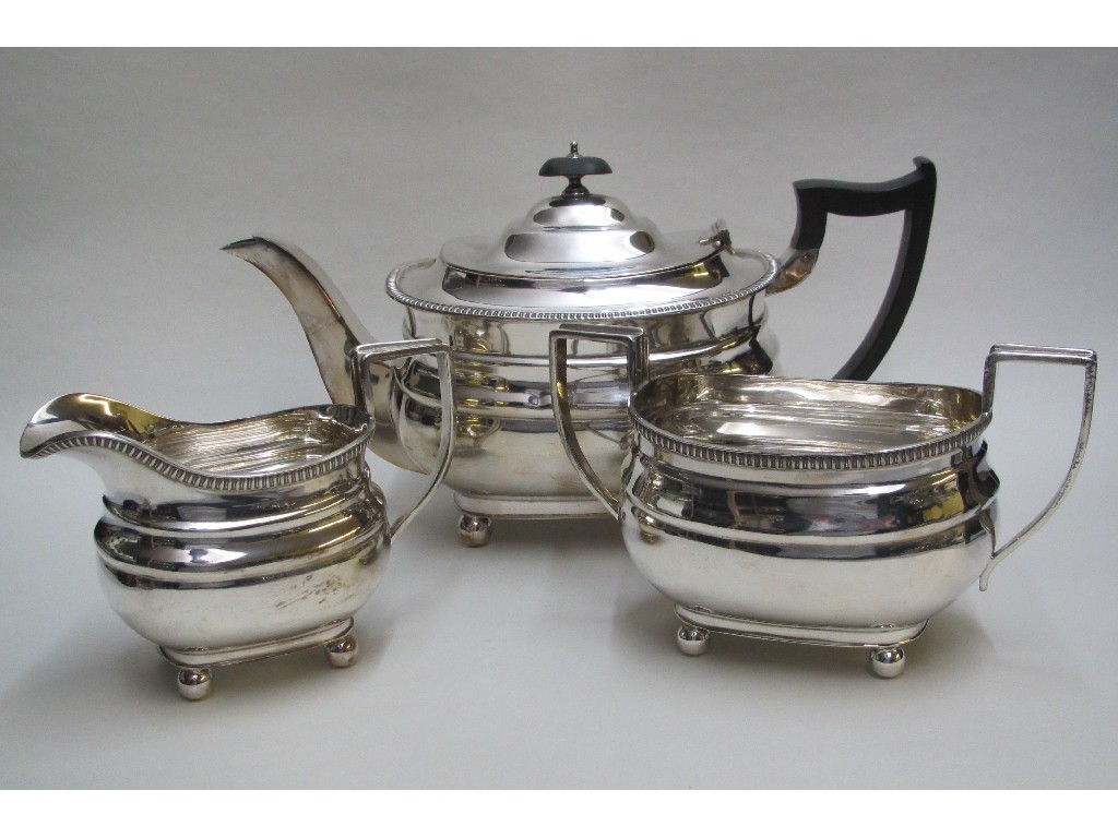 Appraisal: A silver three piece tea service of bombe form Sheffield