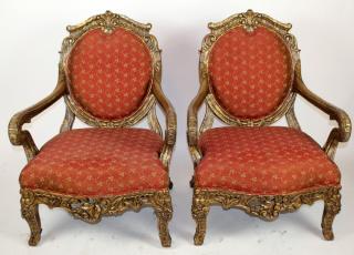 Appraisal: Pair of Louis XV style balloon back armchairs A pair