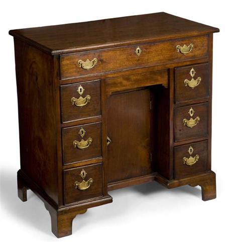 Appraisal: A George III mahogany kneehole dressing table the associated moulded